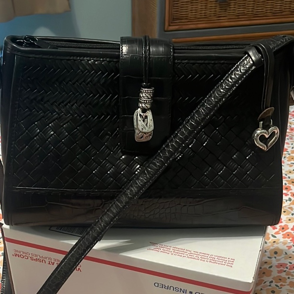 Brighton Black Shoulder Bag with Textured Design measures 12”w x 7.5” strap 41”